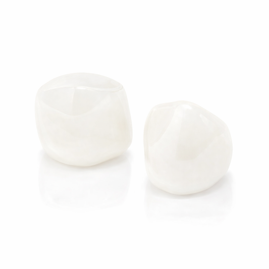 Pojedyncza korona cyrkonowa na górne i dolne kły mleczne